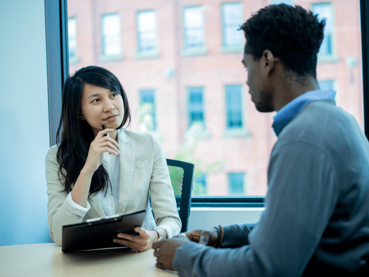Professional conducting one-on-one workplace interview
